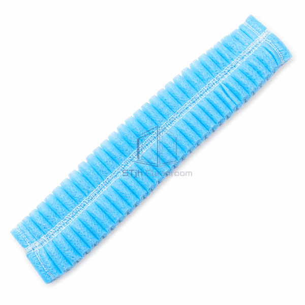 Blue bouffant cap collapsed flat for compact dispensing