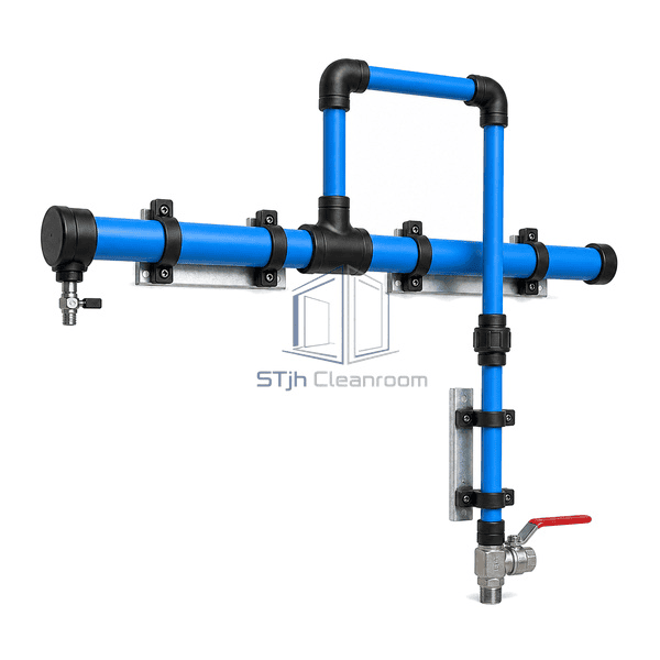 Complete clean compressed air piping low front-left view emphasizing the upward tee, gooseneck outlet valve and left low-point drain interface