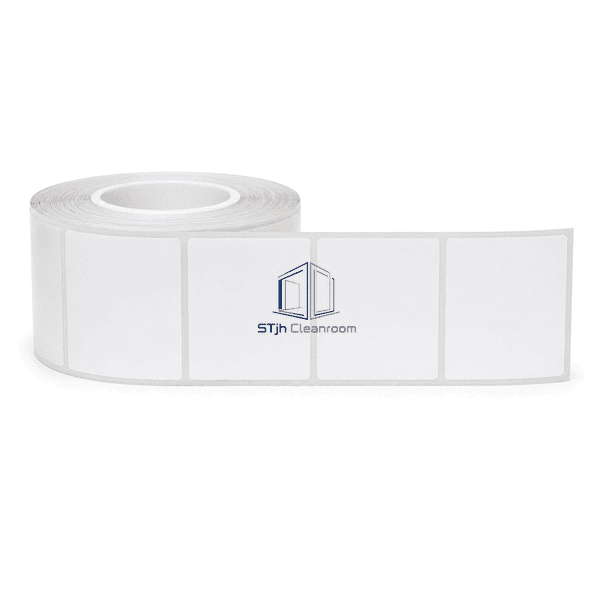 Cleanroom label roll laid horizontally with a short strip of blank labels unrolled
