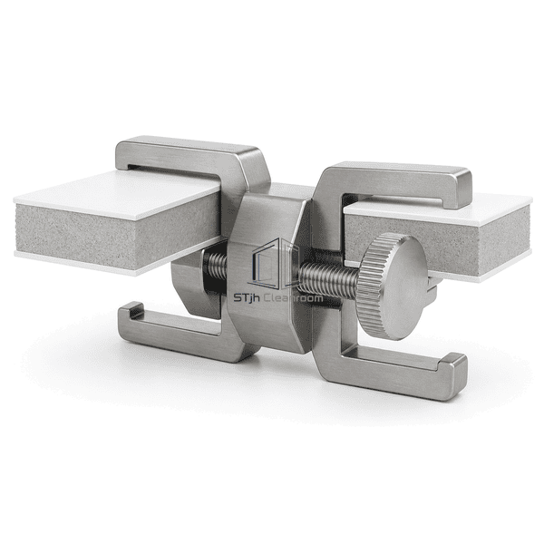 Side view showing cleanroom panel clamp jaws around coated skins and insulated cores