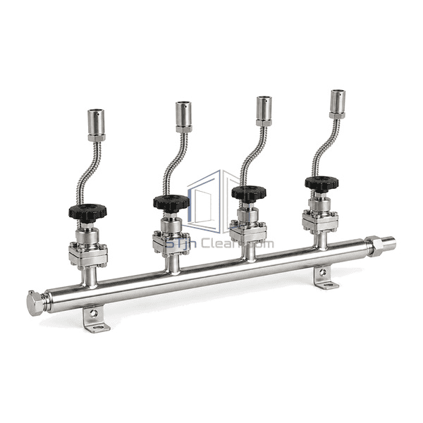 Complete gas manifold low front view emphasizing four pigtail-to-valve joints, the header end purge port and common outlet connection