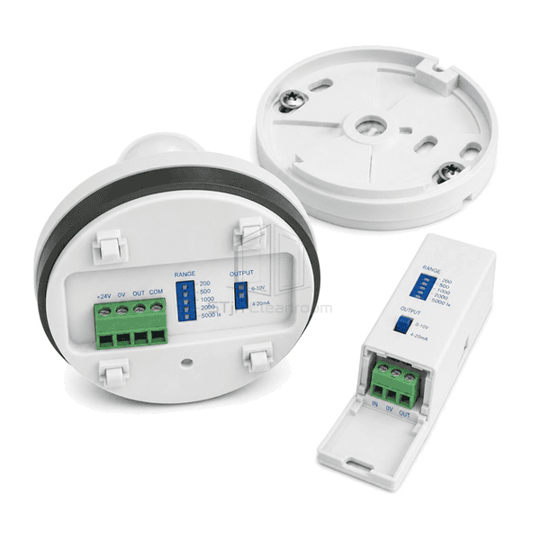 Rear three-quarter view of the entire illuminance sensor with cosine diffuser edge, twist-lock base and lux-output terminal clearly exposed