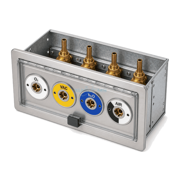 Rear service view of medical gas terminal box showing four brass terminal bodies and four separate copper pipe tails