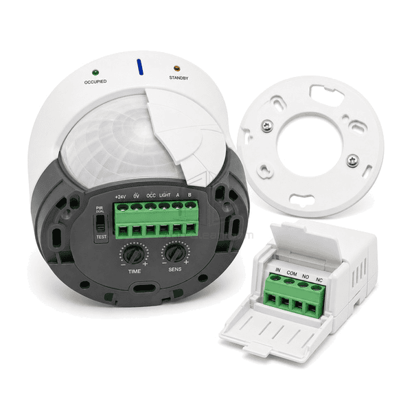 Rear three-quarter view of the entire occupancy sensor with twist-lock base, pluggable output terminal and removable coverage mask clearly exposed