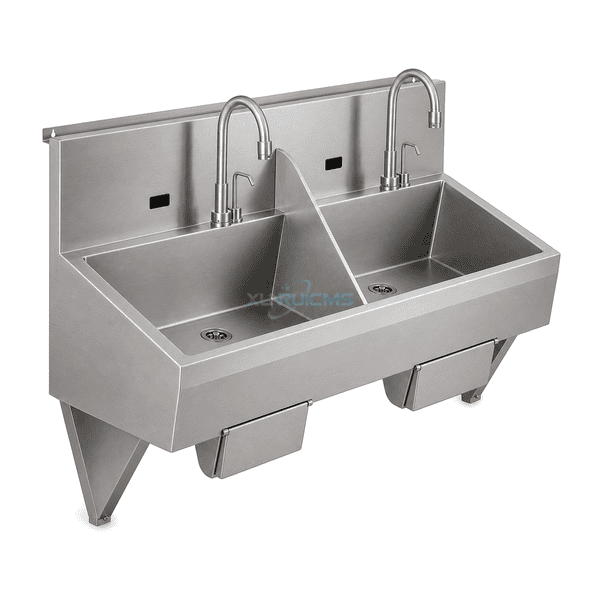 Left-side view of operating room scrub sink showing deep basins, tall backsplash and wall support brackets