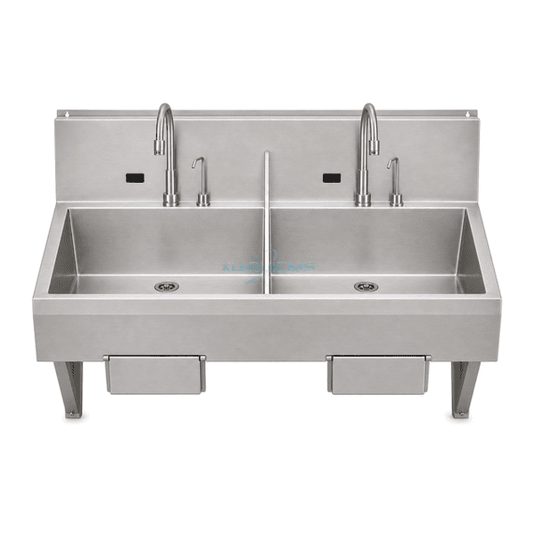 Front elevation of dual-station surgical scrub sink showing two knee panels, sensor windows and separate drains