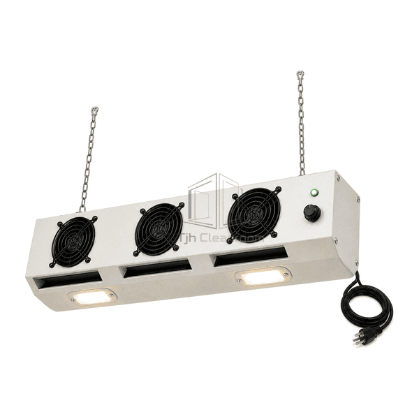 Low underside view of overhead ionizing blower showing three air outlets and two task lights