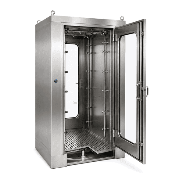 Interior close view of atomising nozzles, coved wall and sloped drain floor