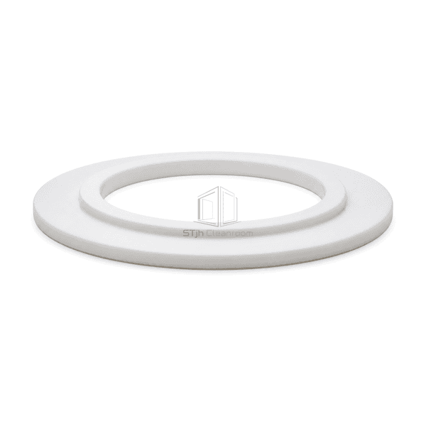 Low horizontal complete view of one white PTFE hygienic clamp gasket laid flat on a white background