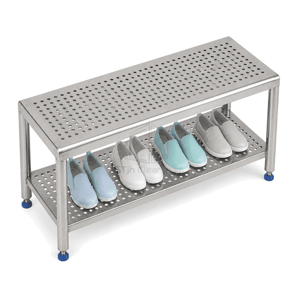 Elevated view of cleanroom bench perforation pattern and open shoe shelf