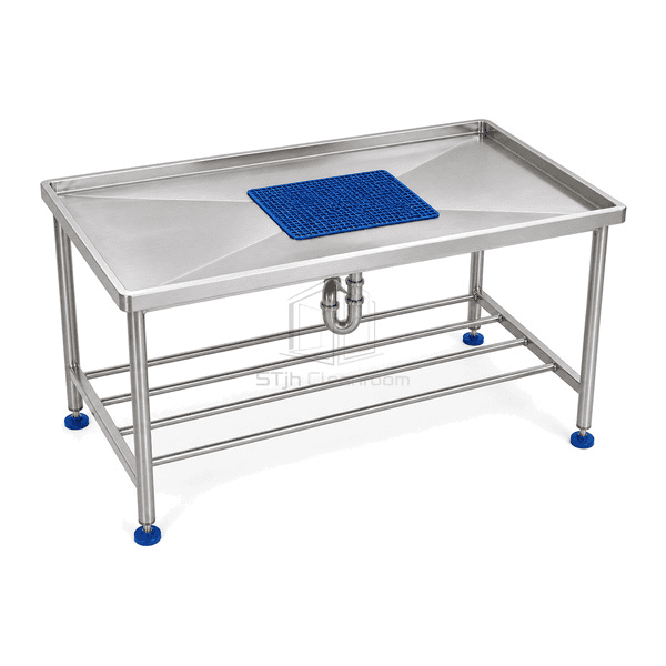 Elevated view of stainless wet-work surface center drain and mesh screen