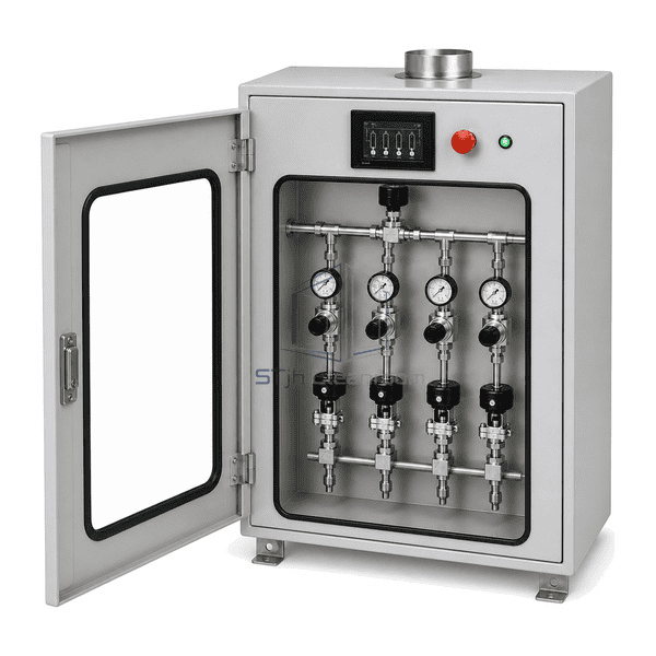Complete valve manifold box side service view with the door open to reveal the common inlet header and four modular distribution sticks